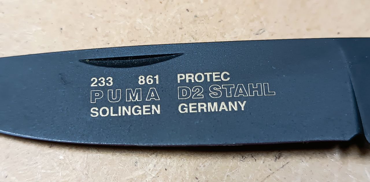 Puma Protec D2 Stahl Solingen Zsebkés Fekete Taktikai Pengével