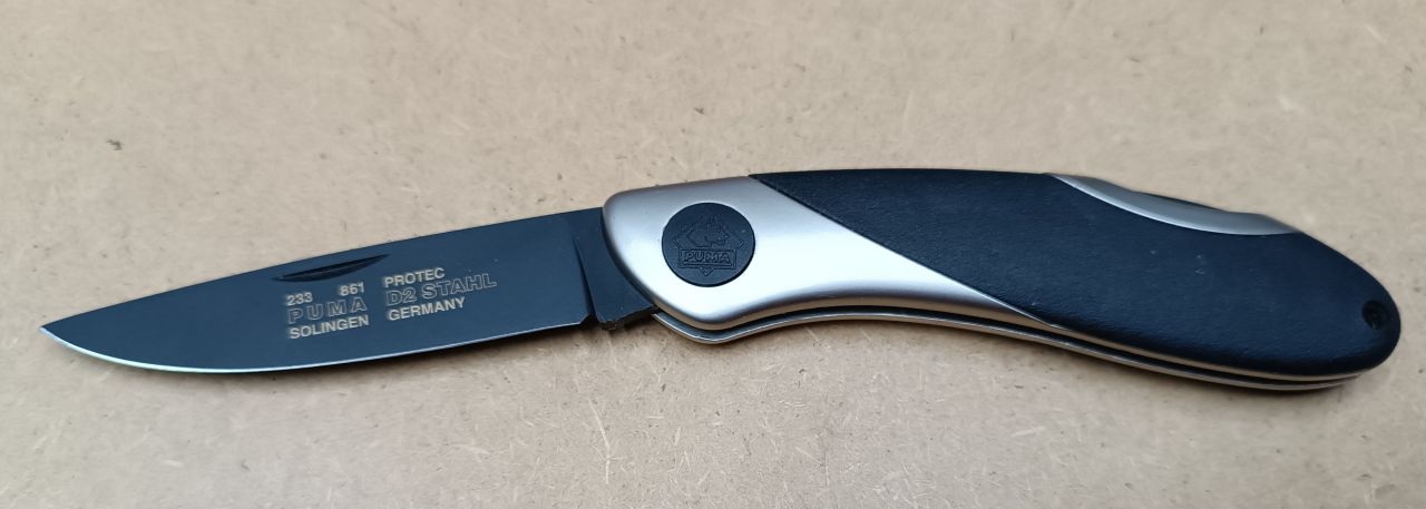 Puma Protec D2 Stahl Solingen Zsebkés Fekete Taktikai Pengével